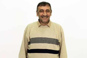Fototapeta premium Mature male model posing at studio. White background and isolated image