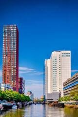 Netherlands Traveling. Attractive Cityscape of Rotterdam City with Canal and Boats in The...