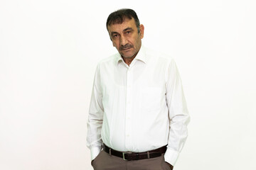 Man wearing a white shirt and fabric pants. Isolated image white background.