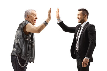 Businessman gesturing high-five with a mature punk rocker