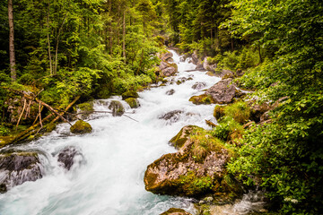 Falling water in the mountains around Hallstatt, famous ancient village in Austria