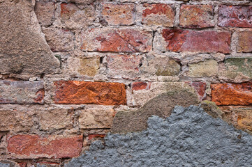 brick wall, old fallen plaster from the wall