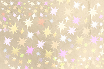 The background is made of crumpled paper with an overlay of colored stars. Background concept