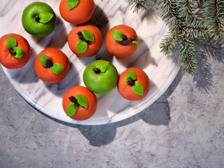 Marzipan sponge apples, green and red. Tasty dessert, real favorite in Autumn and Winter. Flat lay...