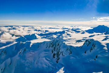 Aerial view from a helicopter. of Fox and Franz Josef Glaciers in the Southern Alps of South...