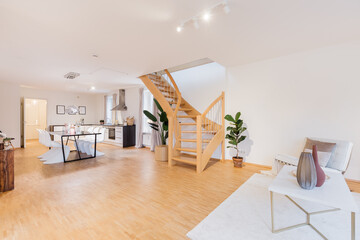 HDR shot of homestaging living room with staircase