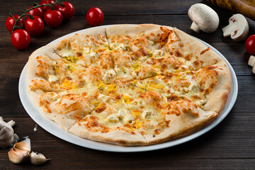 Speciality Italian food Four Cheeses Pizza topped with mozzarella, emmental, gorgonzola and goat...