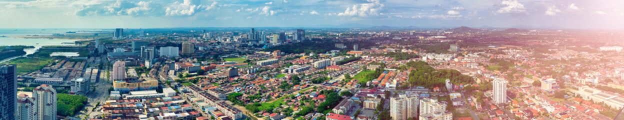 Fototapeta na wymiar MALACCA, MALAYSIA - DECEMBER 29, 2019: Aerial view of city skyline on a beautiful sunny day, panoramic view