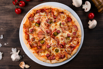 Pizza Pepperoni Salami Bacon and Hamon with Cheese, homemade italian pizza with mozzarella and bacon