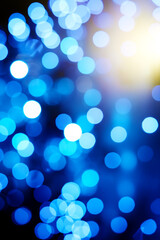 Christmas tree garlands out of focus. bokeh of blue lights