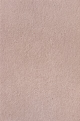 Textured brown vintage paper background. Vertical background for design, closeup
