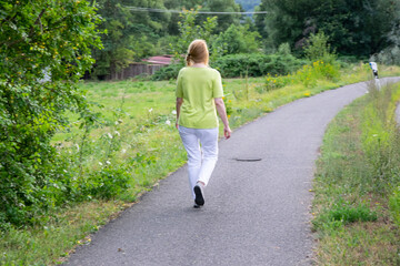 woman walking in the park