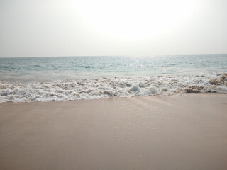 Fototapeta na wymiar Waves on the beach seascape view, Kurumpanai beach in Tamilnadu, India 