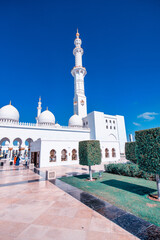 Fototapeta na wymiar ABU DHABI, UAE - DECEMBER 8, 2016: Exterior view of the Sheikh Zayed Grand Mosque