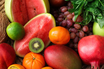 Assortment of fresh exotic fruits as background, closeup