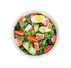 Delicious crab stick salad in bowl isolated on white, top view