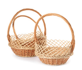 Fototapeta na wymiar Three decorative wicker baskets on white background