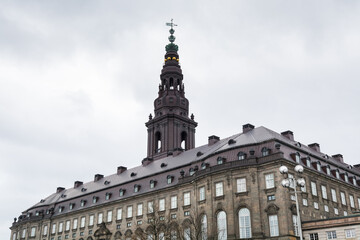 Fototapeta na wymiar Christiansborg Palace, Christiansborg Slot, a palace and government building on the islet of Slotsholmen in central Copenhagen