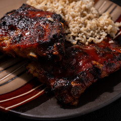 Ribs on a plate with rice 