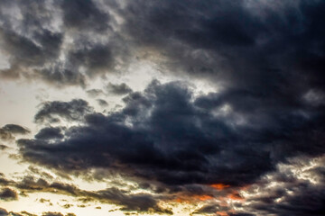 Dark Clouds and Red Sky