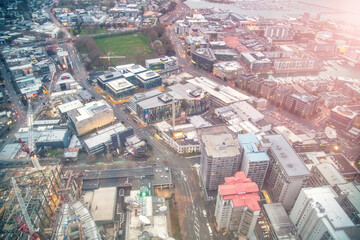 AUCKLAND, NZ - AUGUST 26, 2018: Aerial city view from Sky Tower. Auckland skyline at sunset