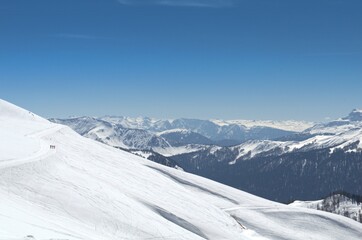 Winter landscape in the mountains with peaks and gorges, freestyle trails.