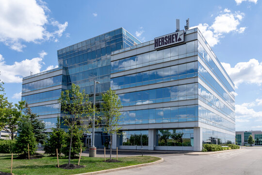 Mississauga, On, Canada - August 11, 2019: Hershey sign on the building in Mississauga. Hershey is an American company and one of the largest chocolate manufacturers in the world.