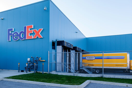Markham, Ontario, Canada - June 2, 2018: FedEx Ship Centre in Markham, Ontario, Canada. FedEx Corporation is an American multinational courier delivery services company. 
