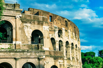 The Colosseum and the homonymous square on a summer day, Rome, Italy
