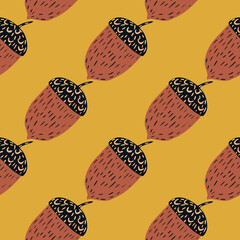 Autumn seamless pattern with paste tones chestnut hand drawn elements on yellow background.