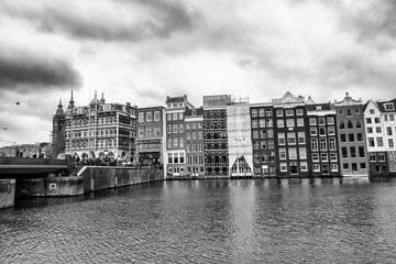 AMSTERDAM, THE NETHERLANDS - APRIL 25, 2015: Traditional houses and buildings on the canal