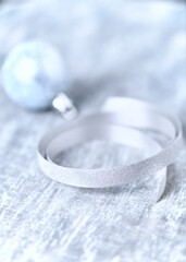 Simple Christmas decoration. Bright wooden background. Close up. Copy space. 