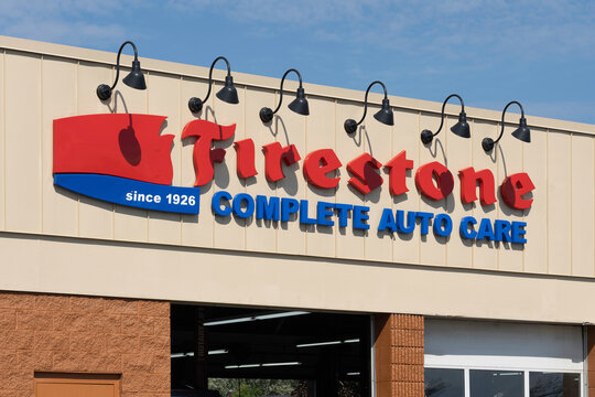 Buffalo, New York, USA - September 22, 2019: Sign of a Firestone Complete Auto Care in Buffalo; a division of Firestone, American tire company,  that offers automotive maintenance and repair.