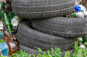 Used tires and bottles thrown away