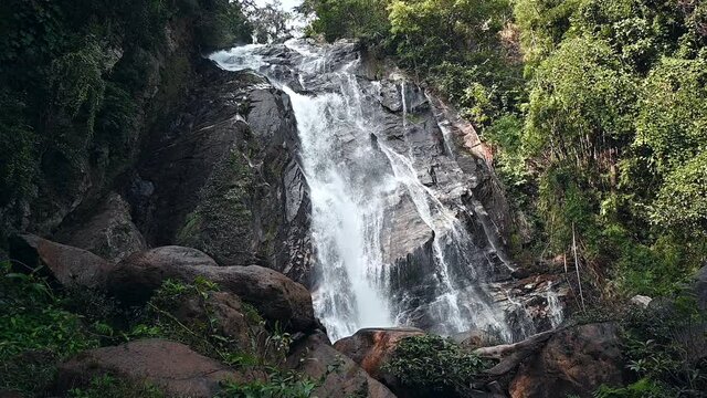 Footage video of Mae Tia waterfall located in the jungle of Orb Luang National Park in Chiang Mai province, Thailand.