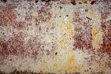 Red-yellow rust on a sheet of metal. Rust on a metal surface. Top view, flat lay.