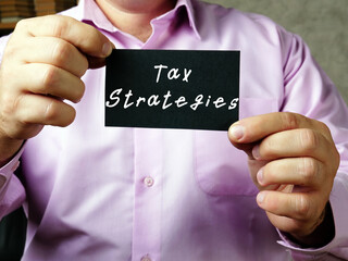 Financial concept meaning Tax Strategies with sign on the sheet.