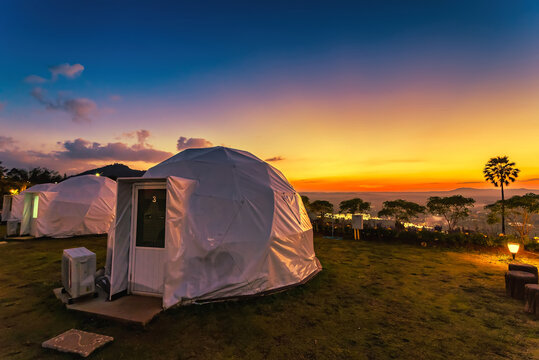 Phetchabun, Thailand - November, 28, 2020 : Geodesic dome Tents Of Status Resort on hill in sun set time at Khao Kho, Phetchabun, Thailand
