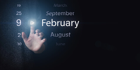 February 9th. Day 9 of month, Calendar date. Hand click luminous icon PLAY and DATE on dark blue...