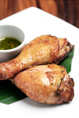 roast chicken drumsticks appetizer with spicy thai green chilli sauce