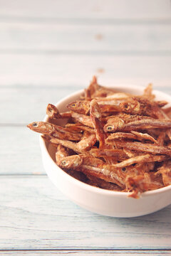 Dried Indian anchovies fish on bowl	

