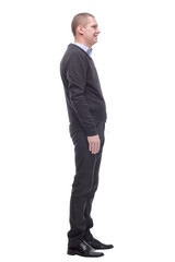 Full length profile portrait of a man standing on white background