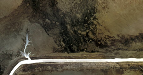 the last tree, United States, abstract photography of relief drawings in  fields in the U.S.A. from...