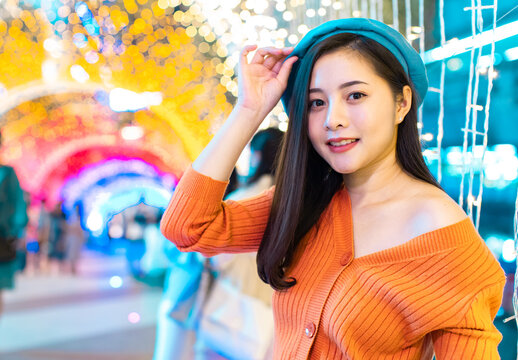 Happy Young Asian Woman Taking A Selfie Photo Near Christmas Tree At Home Celebrating New Year. Female Teen Happy Smiling Celebrate Xmas Winter Holidays .Blogger Asian Girl Live Social Media.