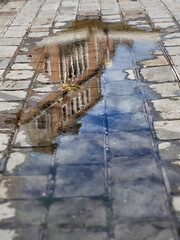 VENICE, ITALY:  Old buildings shown in puddle as texture or background
