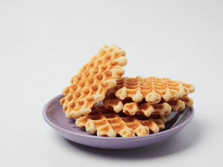 Traditional Belgian waffles isolated on white background, top view