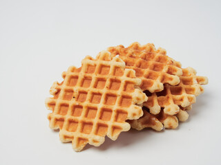 Traditional Belgian waffles isolated on white background, top view