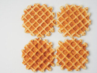 Traditional Belgian waffles isolated on white background, top view