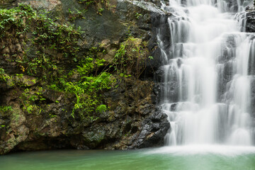 Fototapeta na wymiar Ton Rak Sai Waterfall is in Namtok Sam Lan National Park ,Saraburi Thailand