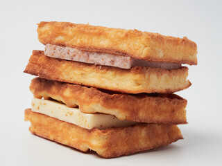 Traditional Belgian waffles isolated on white background, top view